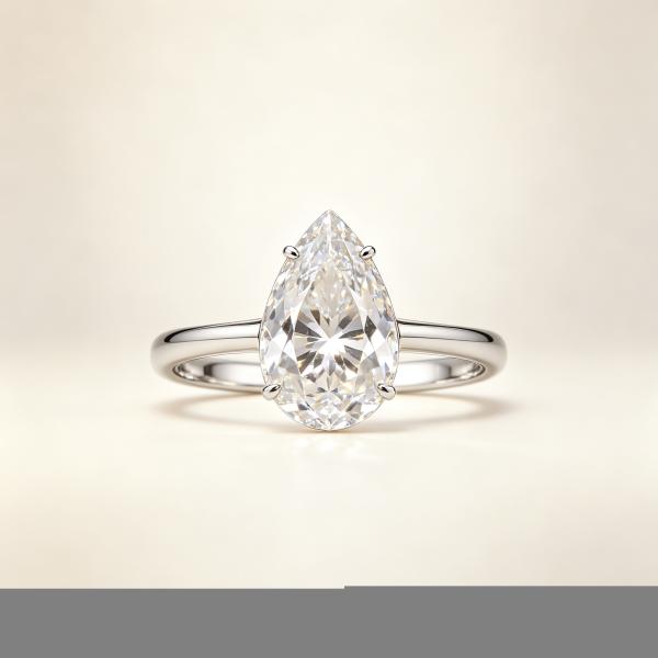Pear Solitaire Ring